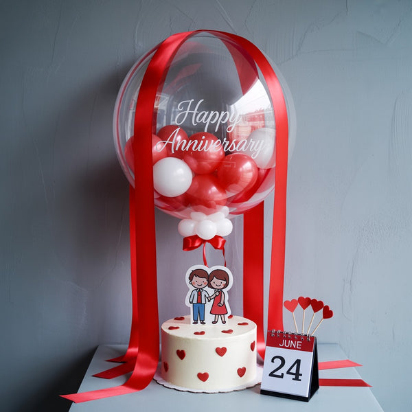 Balloon Surprise Anniversary Cake with Red Hearts and Custom Celebration Date